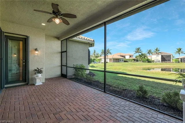 a view of a porch with wooden floor and outdoor space
