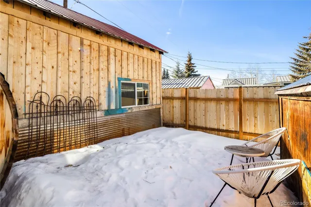 a view of swimming pool with outdoor seating