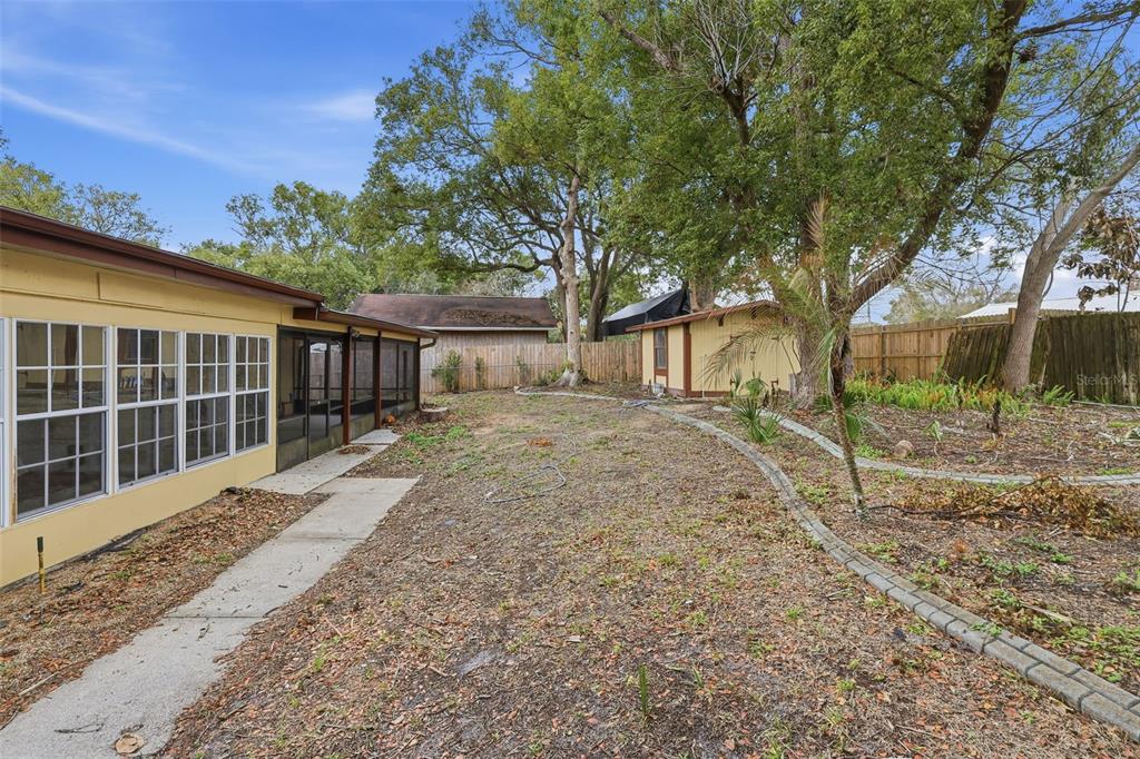 244 Angeles Road DeBary, FL 32713 - Photo 35 of 41 a house view with a backyard space