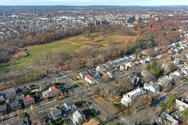 an aerial view of residential building and lake view