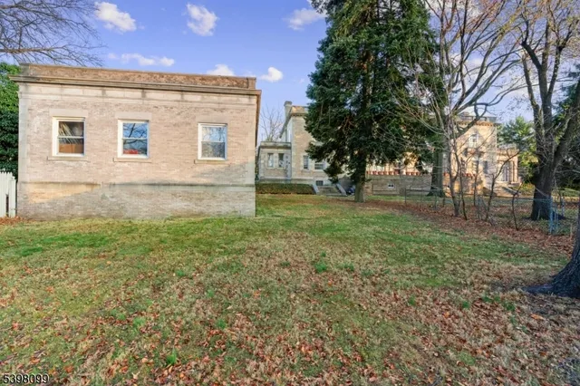 view of a house with a yard