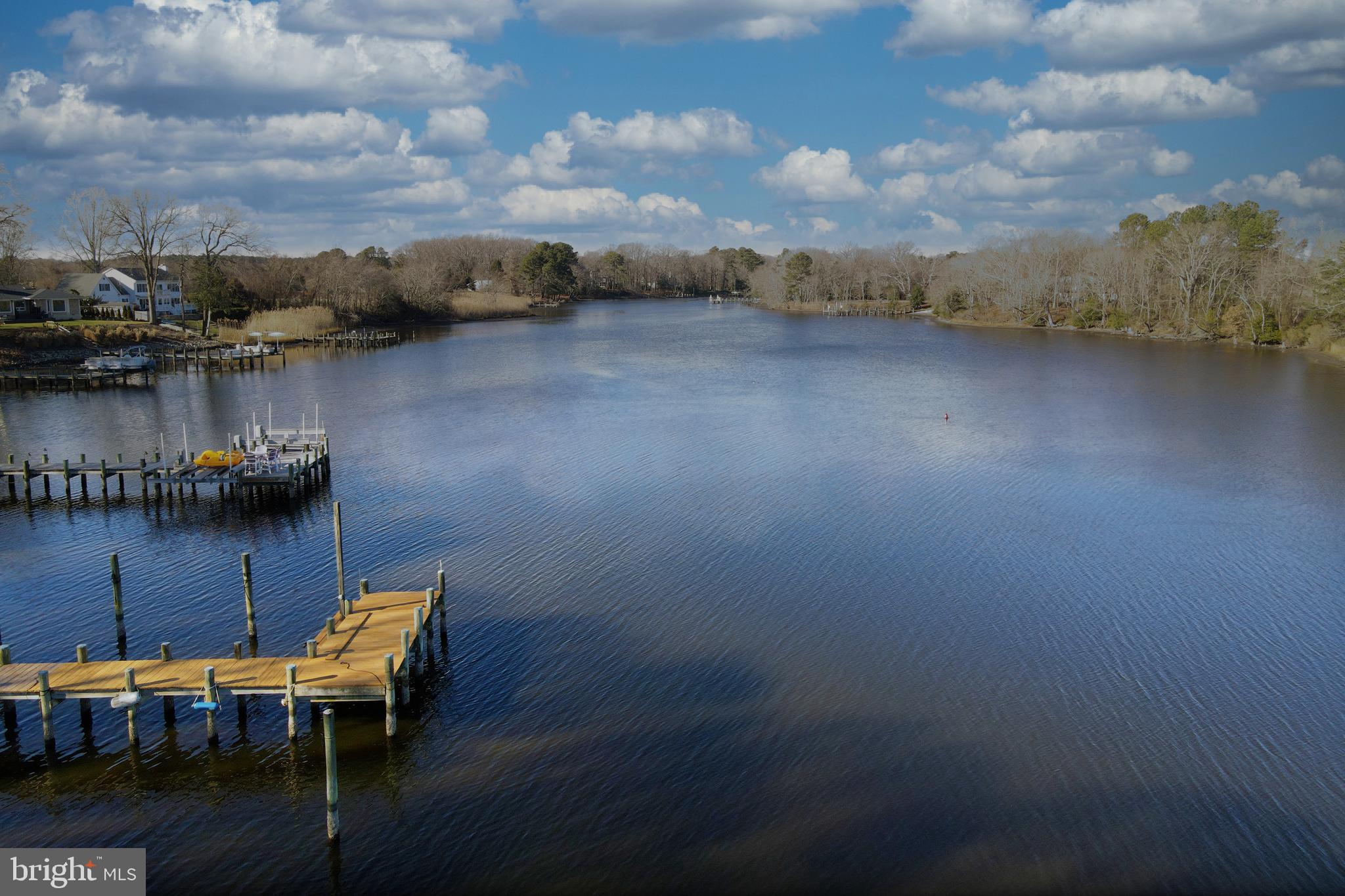 0 South Piney Point Road Bishopville, MD 21813 - Photo 7 of 7 a view of a lake with outdoor seating