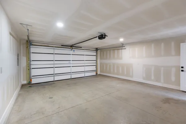 a view of an empty room with a cabinet