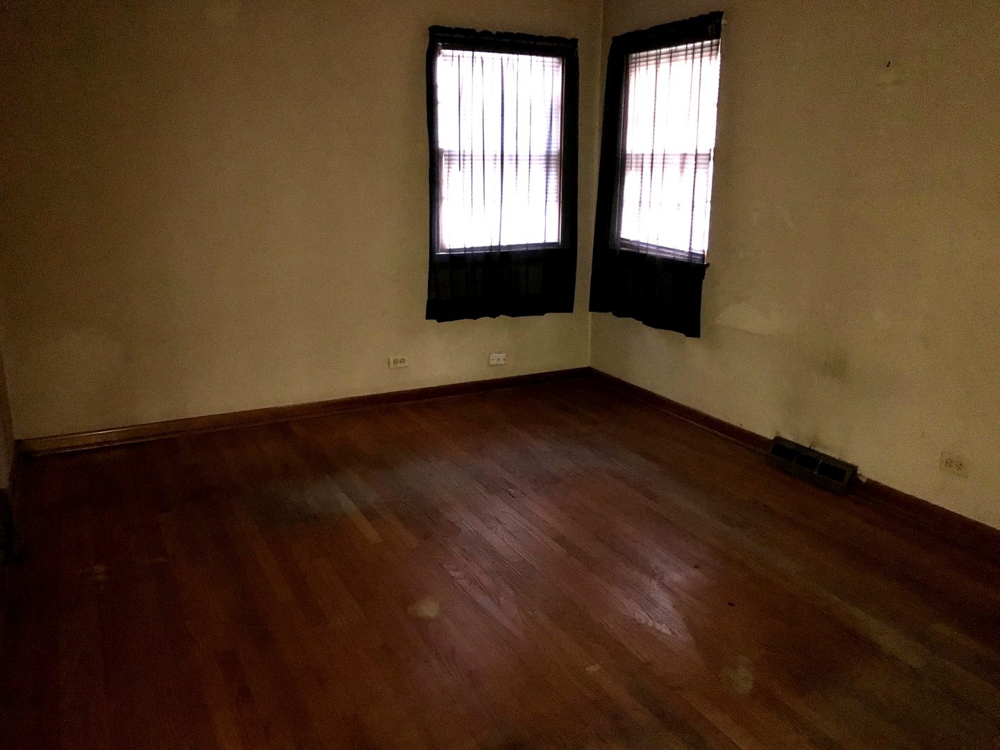 7331 Ogden Avenue Lyons, IL 60534 - Photo 11 of 15 an empty room with wooden floor and windows