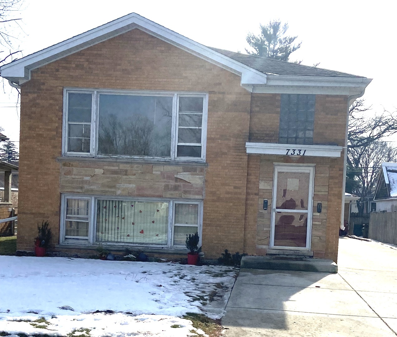 7331 Ogden Avenue Lyons, IL 60534 - Photo 2 of 15 a front view of a house with a yard