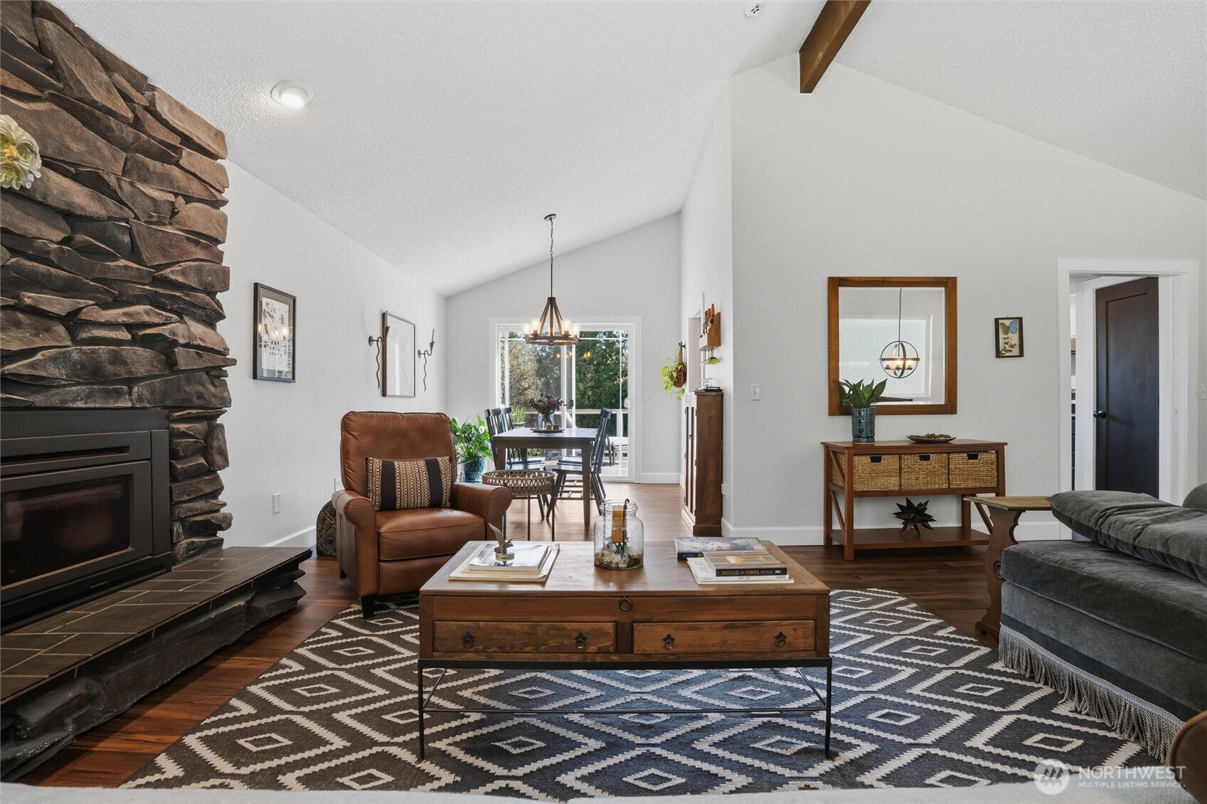 2065 Opdal Road East Port Orchard, WA 98366 - Photo 11 of 40 a living room with furniture and a fireplace