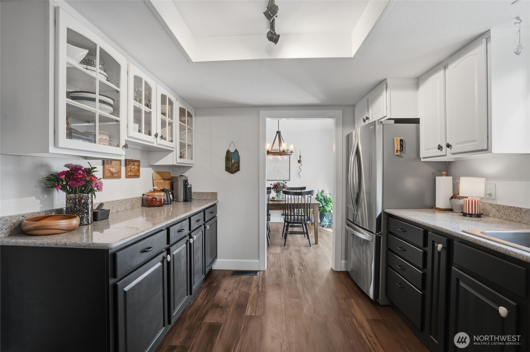 2065 Opdal Road East Port Orchard, WA 98366 - Photo 20 of 40 a kitchen with stainless steel appliances granite countertop a sink stove and refrigerator