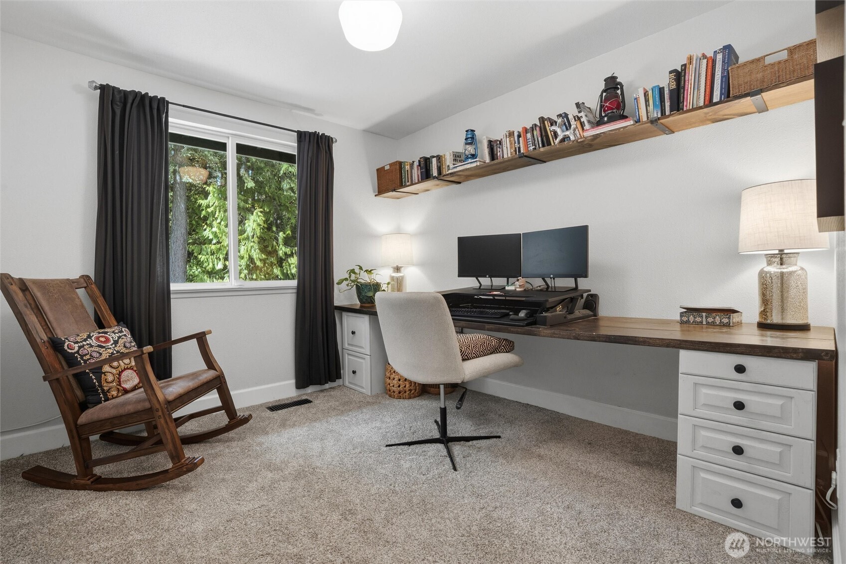 2065 Opdal Road East Port Orchard, WA 98366 - Photo 23 of 40 a view of a workspace with furniture and a window