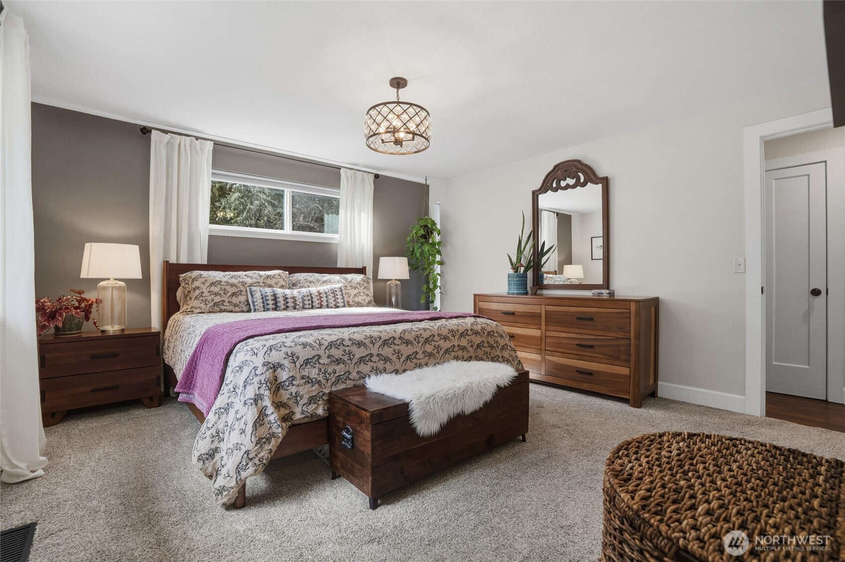 2065 Opdal Road East Port Orchard, WA 98366 - Photo 25 of 40 a bedroom with a bed and a table