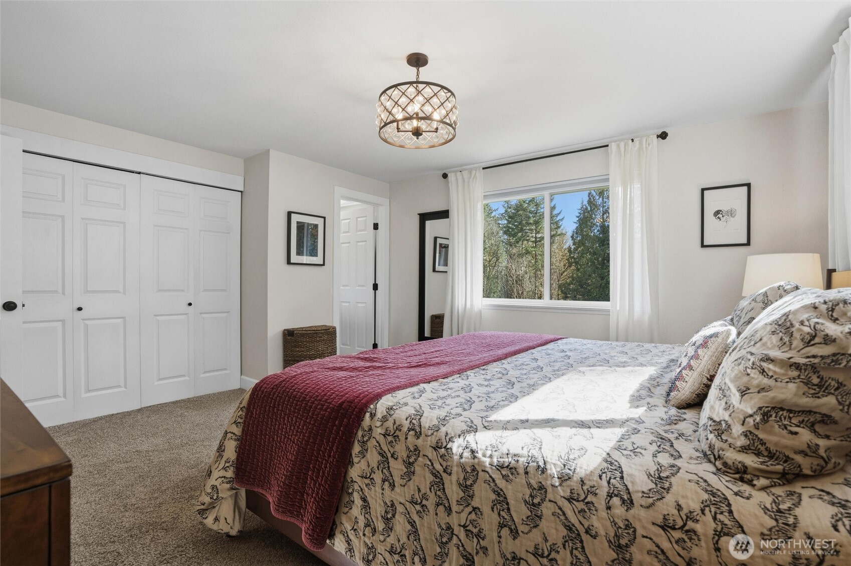 2065 Opdal Road East Port Orchard, WA 98366 - Photo 26 of 40 a bedroom with a bed and a window