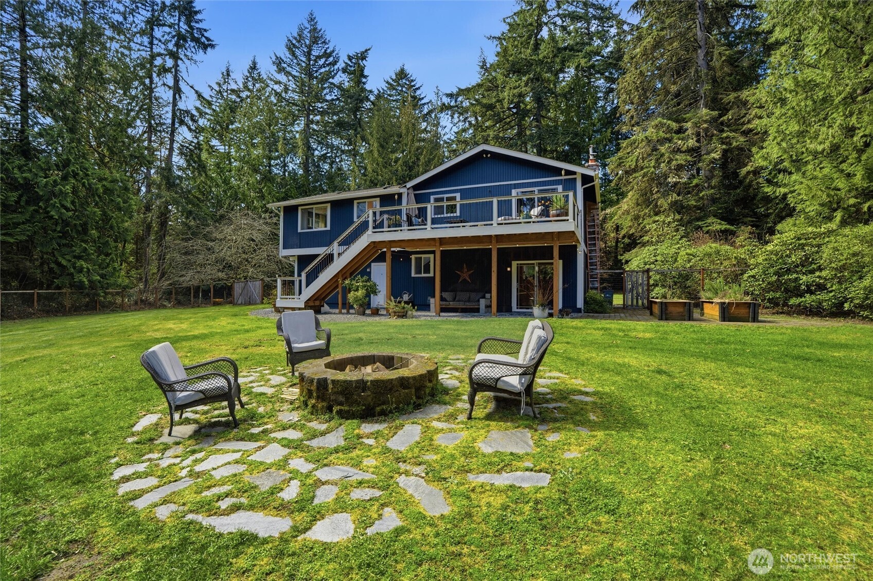 2065 Opdal Road East Port Orchard, WA 98366 - Photo 37 of 40 a front view of a house with garden