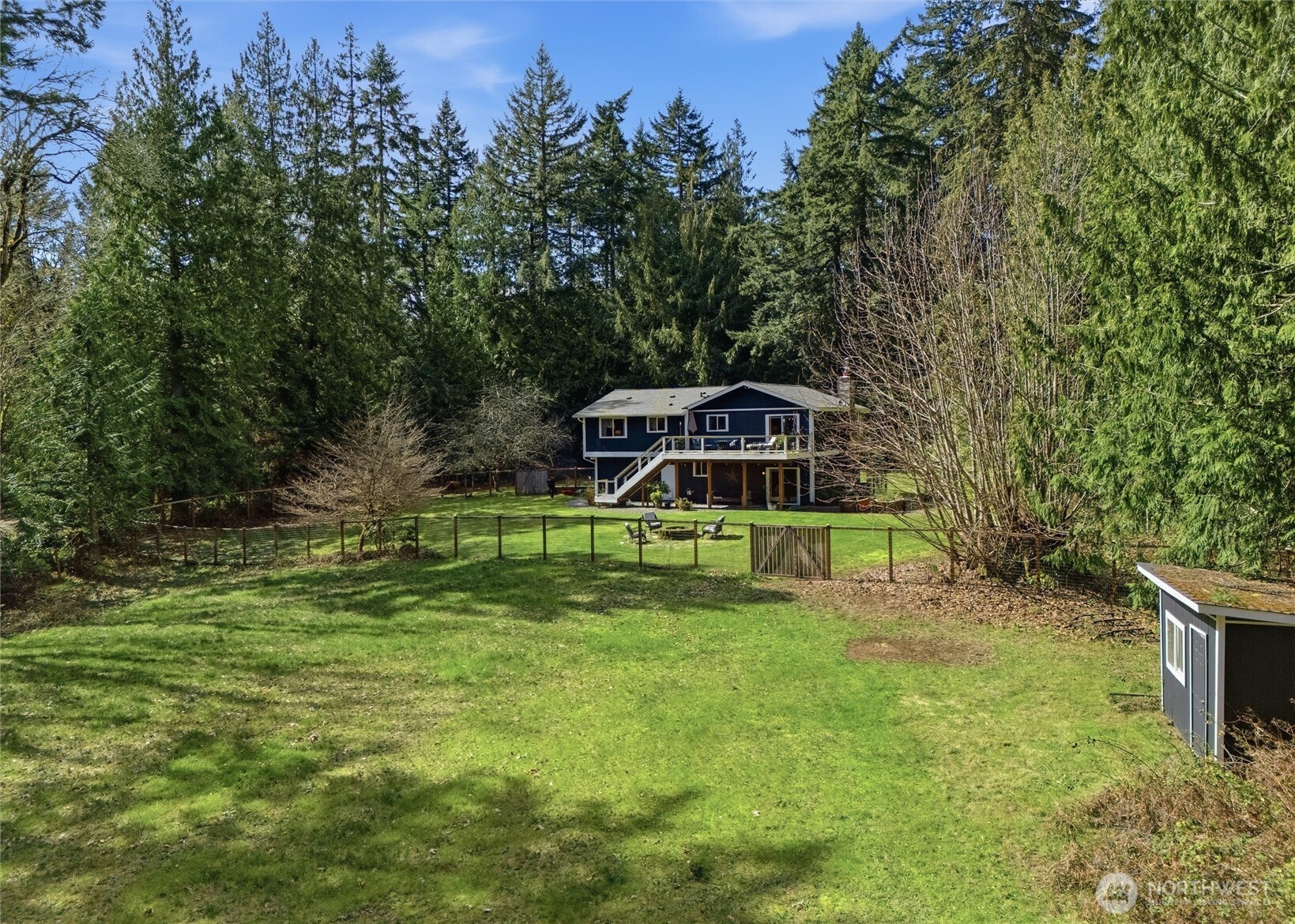2065 Opdal Road East Port Orchard, WA 98366 - Photo 38 of 40 a view of a house with a big yard