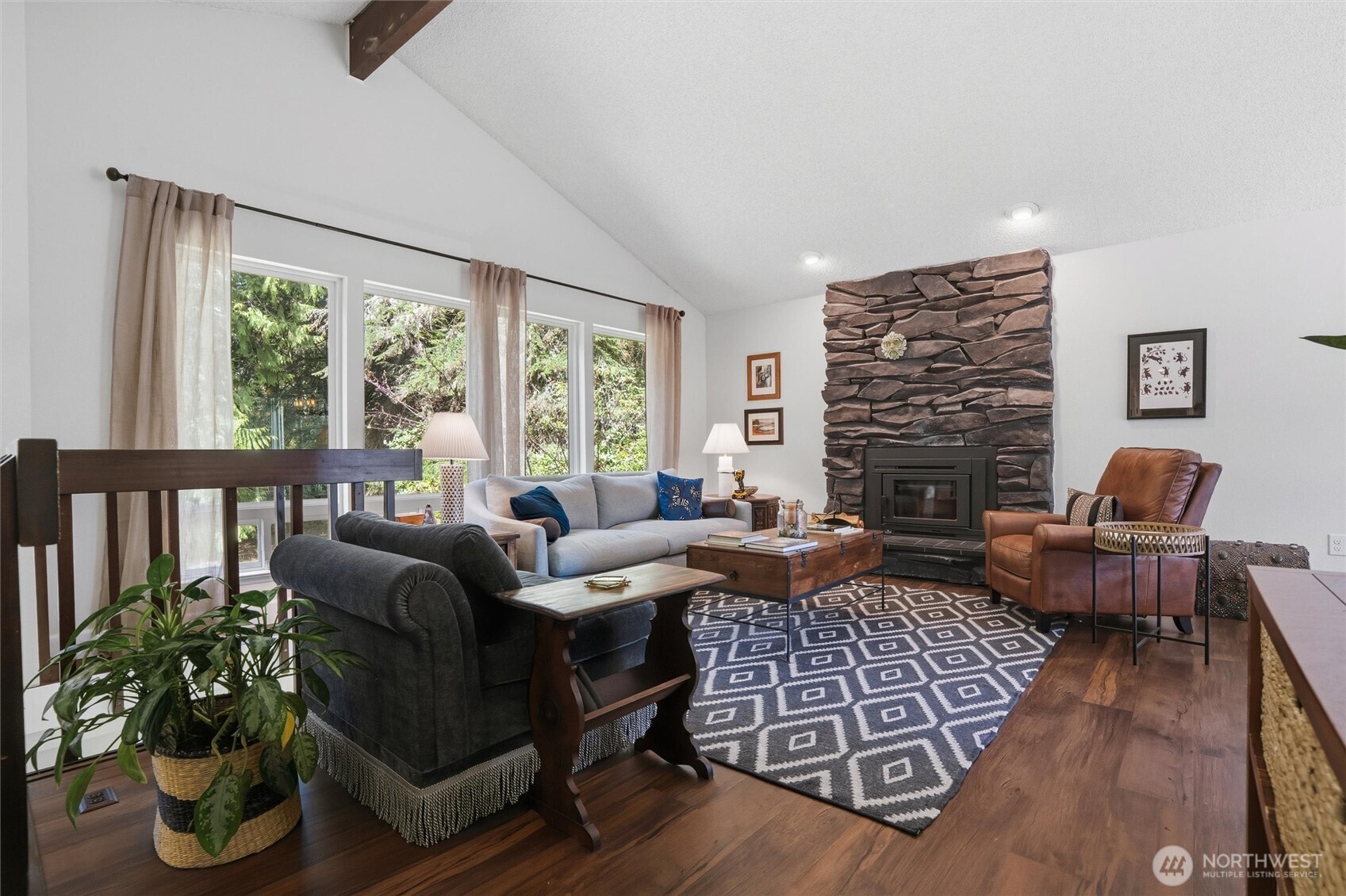 2065 Opdal Road East Port Orchard, WA 98366 - Photo 8 of 40 a living room with furniture fireplace and a large window
