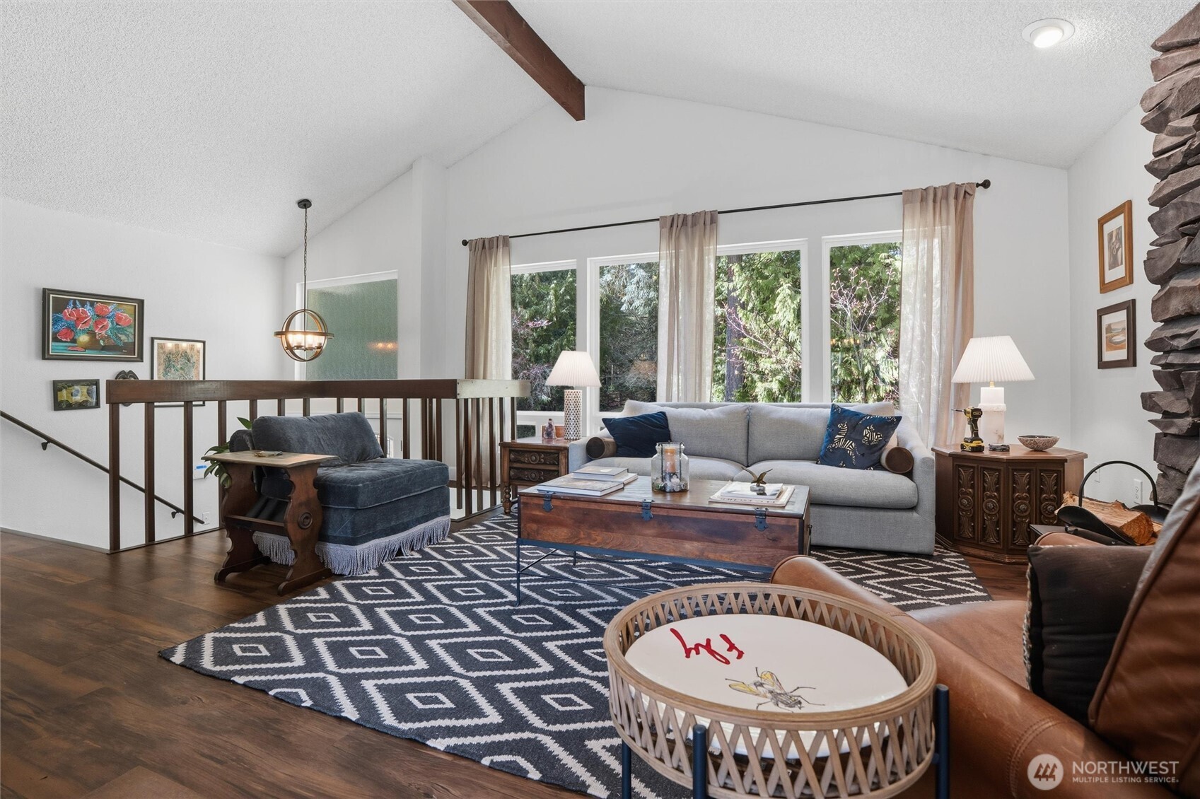 2065 Opdal Road East Port Orchard, WA 98366 - Photo 9 of 40 a living room with furniture a rug and a large window