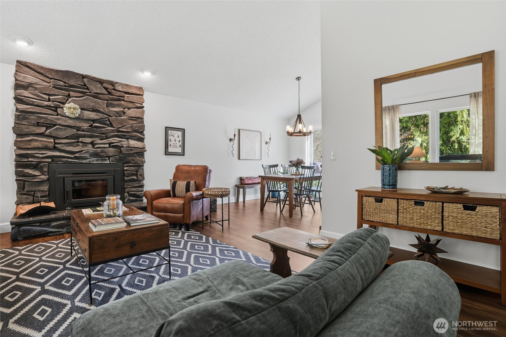 2065 Opdal Road East Port Orchard, WA 98366 - Photo 10 of 40 a living room with furniture and a fireplace