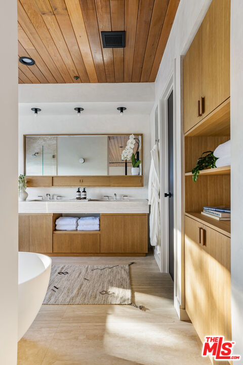 20711 Hillside Drive Topanga, CA 90290 - Photo 15 of 41 a view of kitchen with wooden floor