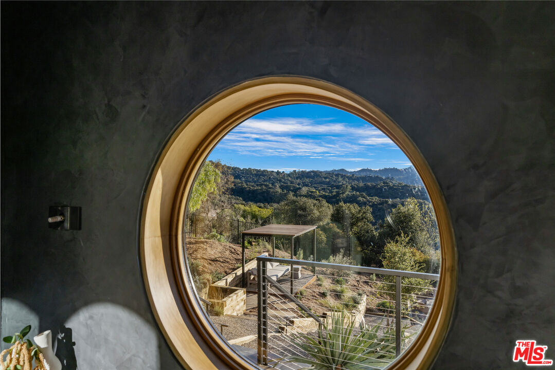 20711 Hillside Drive Topanga, CA 90290 - Photo 31 of 41 a view of a livingroom with furniture