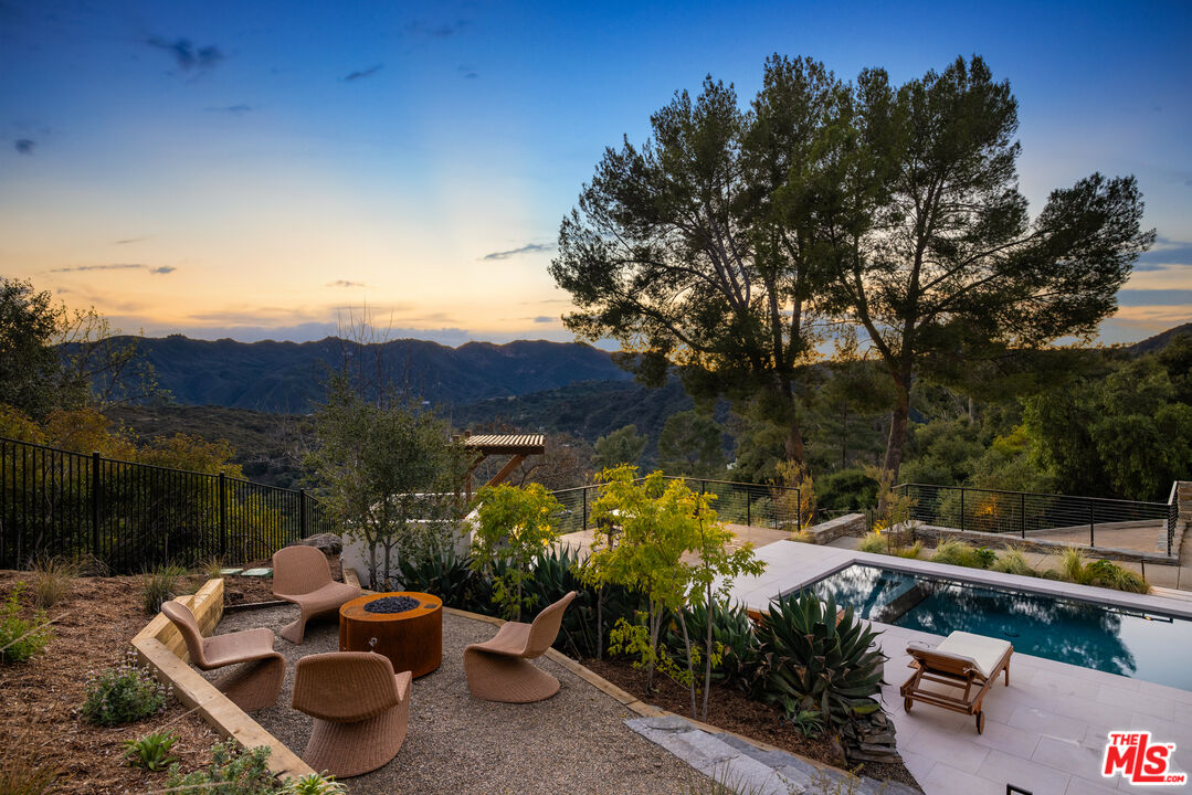 20711 Hillside Drive Topanga, CA 90290 - Photo 36 of 41 a view of a backyard with plants and a patio
