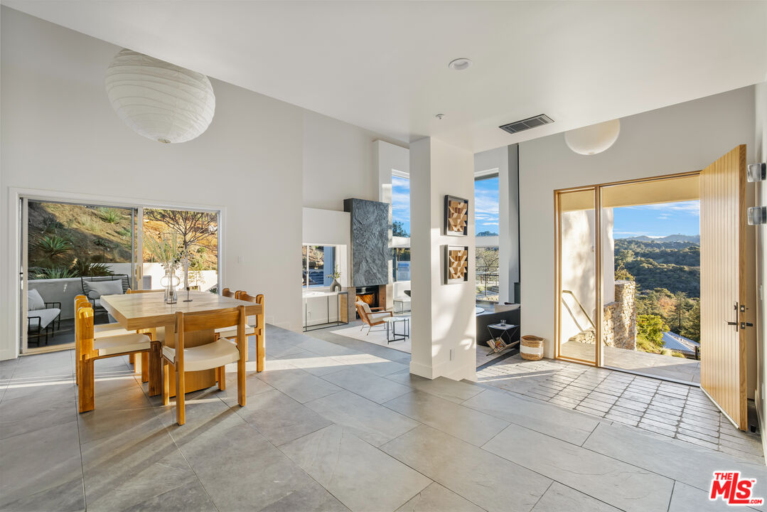 20711 Hillside Drive Topanga, CA 90290 - Photo 5 of 41 a large living room with a large window