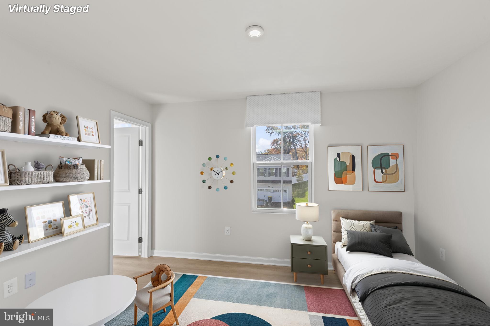 5404 Vergo Road Capitol Heights, MD 20743 - Photo 15 of 36 a living room with furniture and a window