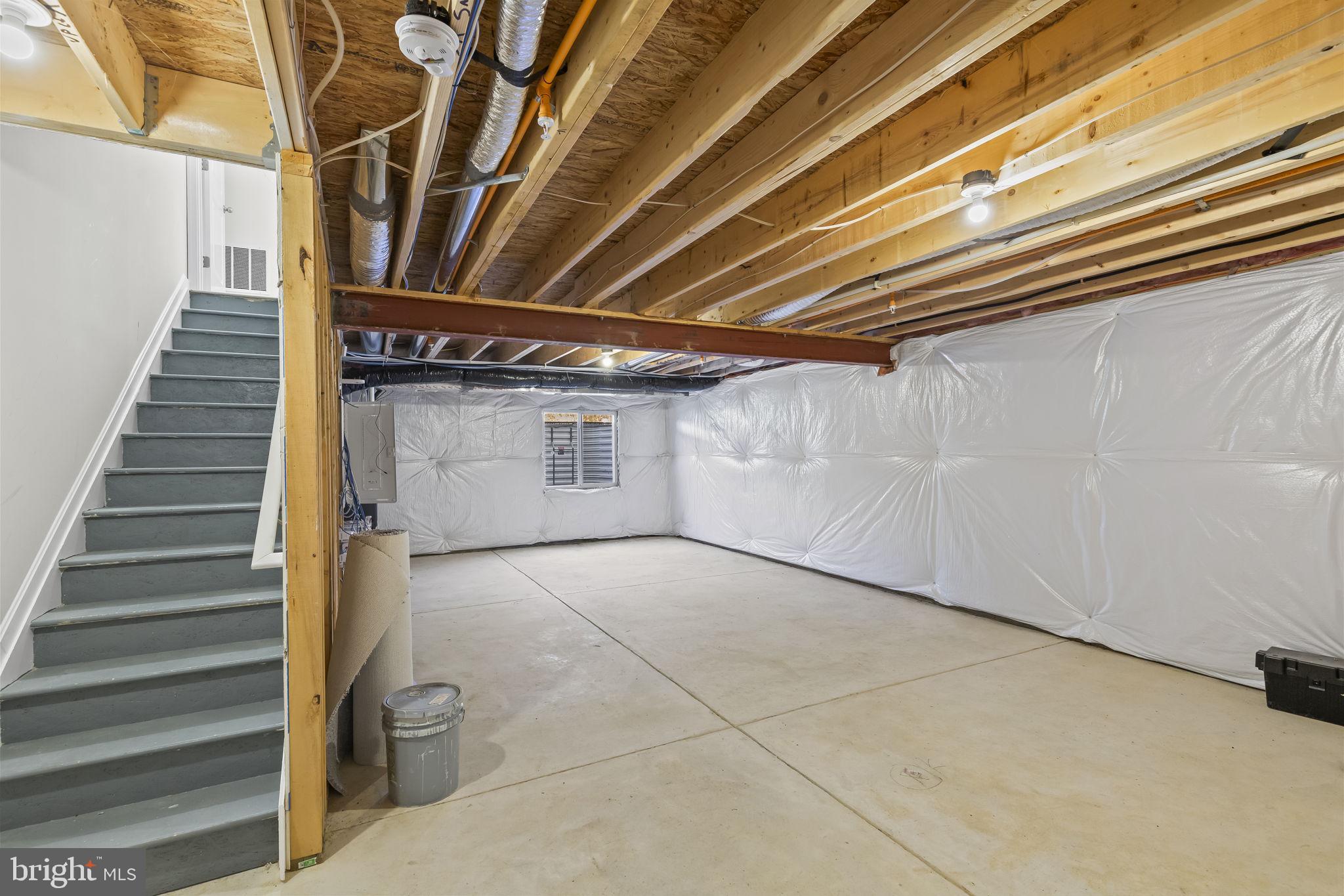 5404 Vergo Road Capitol Heights, MD 20743 - Photo 27 of 36 a view of an empty room with stairs