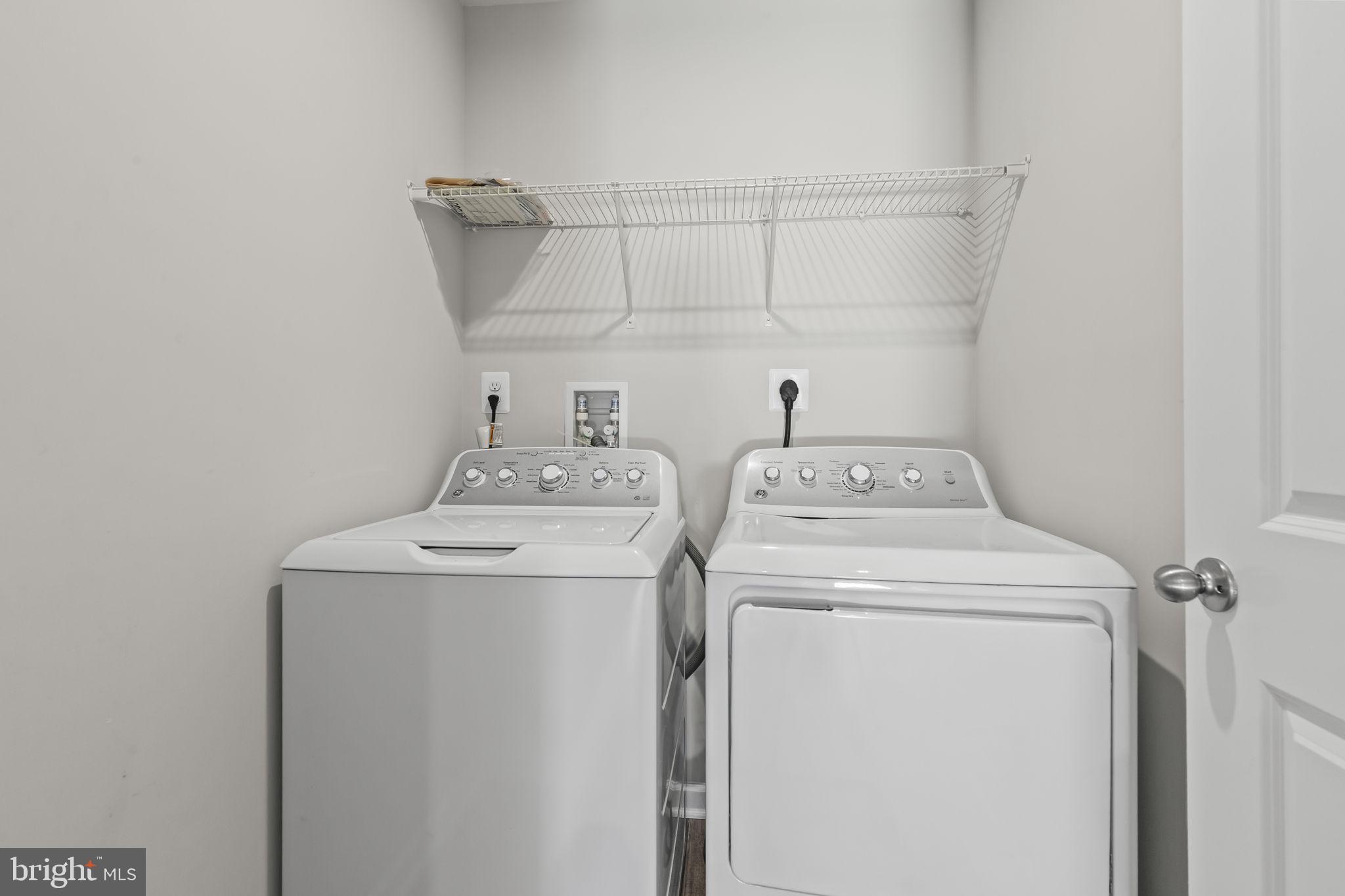 5404 Vergo Road Capitol Heights, MD 20743 - Photo 29 of 36 a utility room with dryer and washer