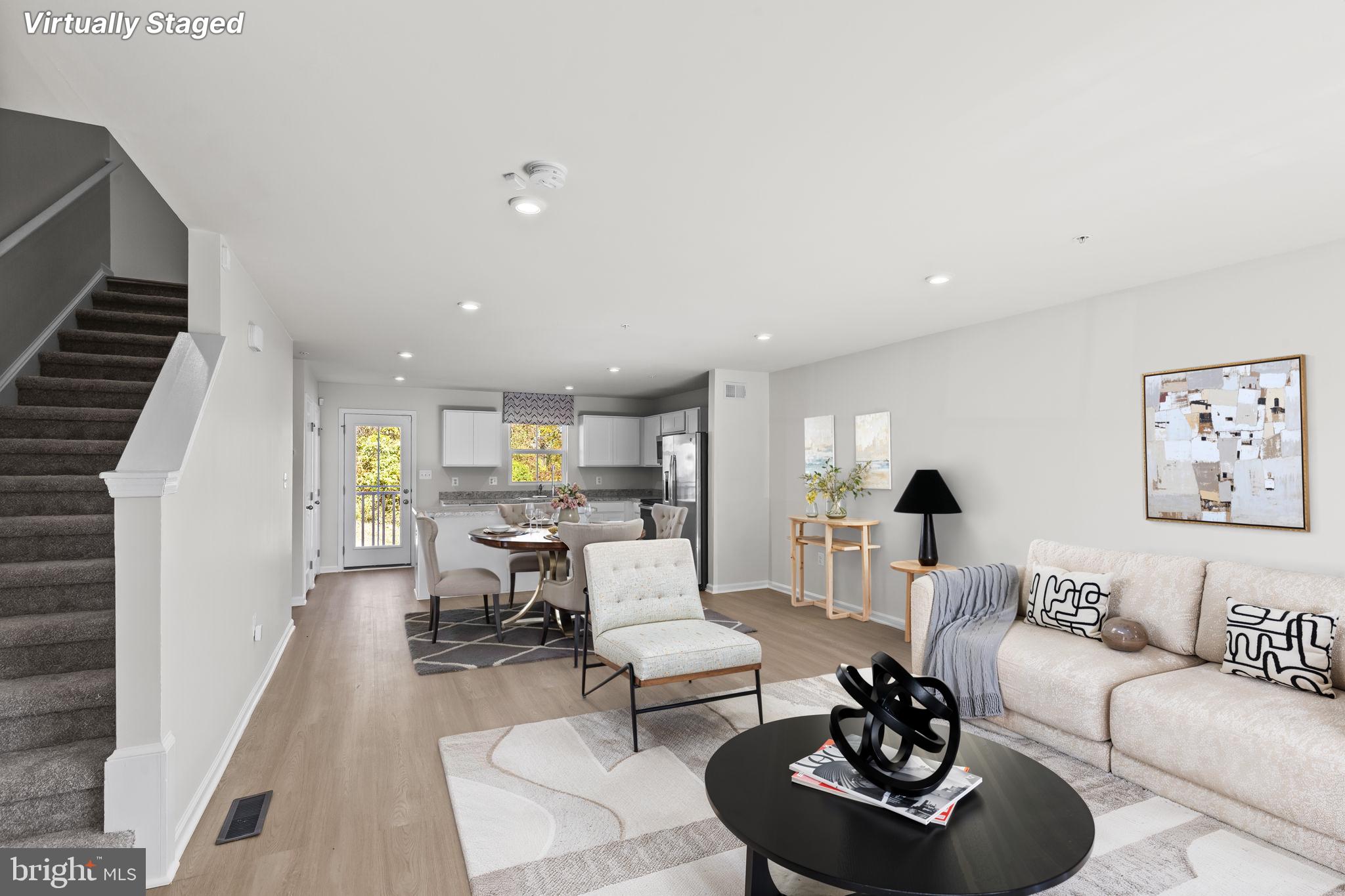 5404 Vergo Road Capitol Heights, MD 20743 - Photo 3 of 36 a living room with furniture and a wooden floor