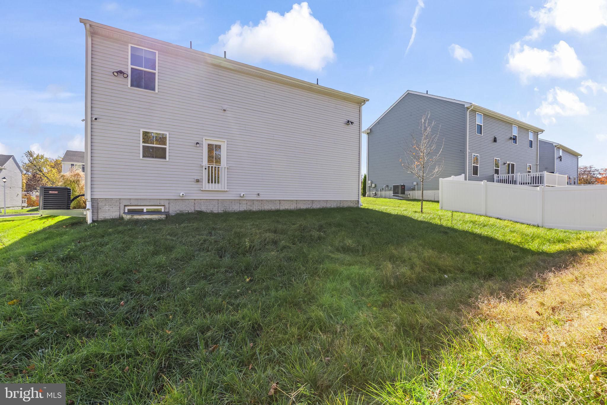 5404 Vergo Road Capitol Heights, MD 20743 - Photo 33 of 36 a view of a house with a yard