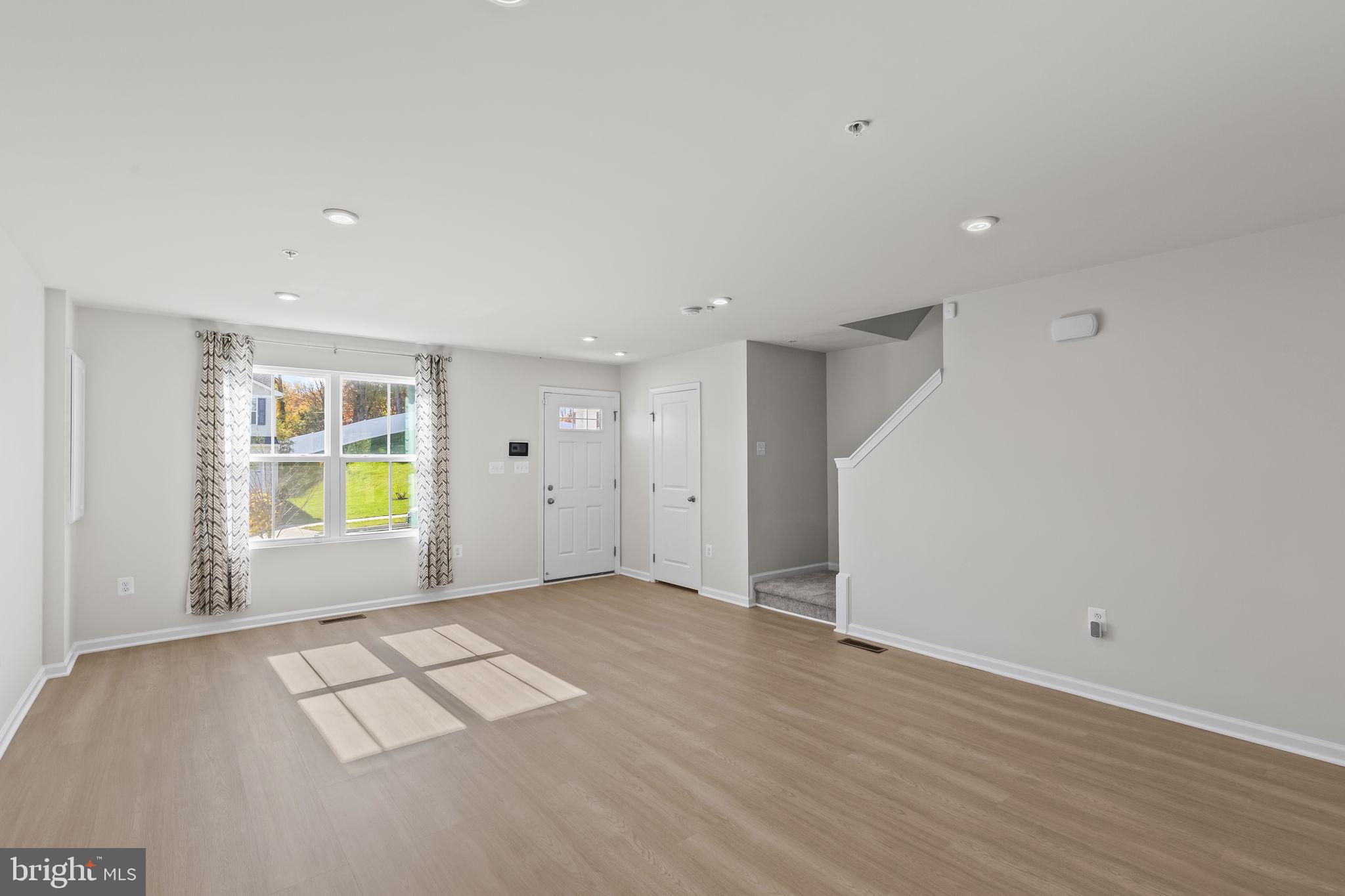 5404 Vergo Road Capitol Heights, MD 20743 - Photo 5 of 36 a view of an empty room with a window