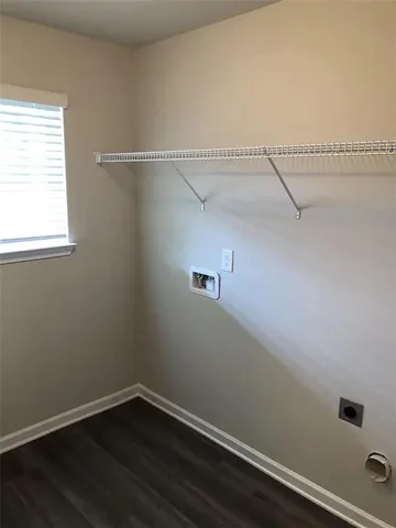 a view of a small space with racks on the wall