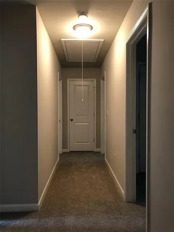 a view of a hallway with a hallway