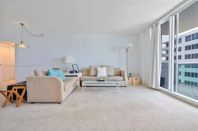 a living room with furniture and a couch