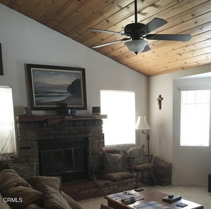 400 Burnham Road Oak View, CA 93022 - Photo 8 of 9 a living room with furniture and a fireplace