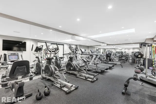 a view of a room with gym equipment