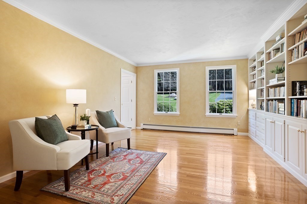 104 Nourse Road Bolton, MA 01740 - Photo 15 of 34 a living room with furniture and two window