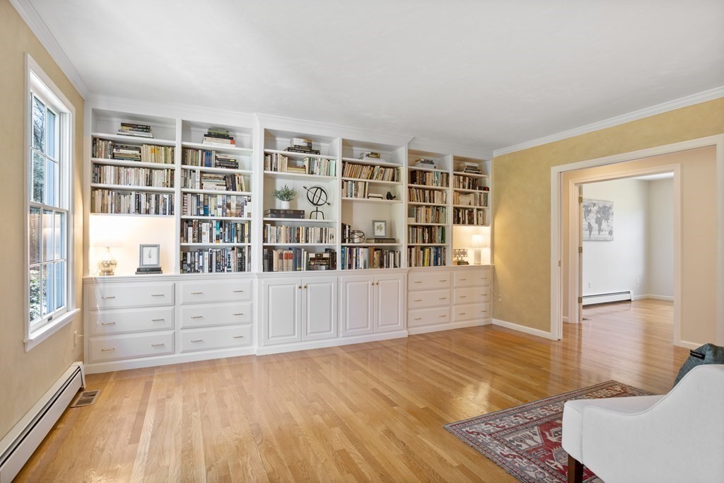 104 Nourse Road Bolton, MA 01740 - Photo 16 of 34 a view of an empty room with wooden floor and a window