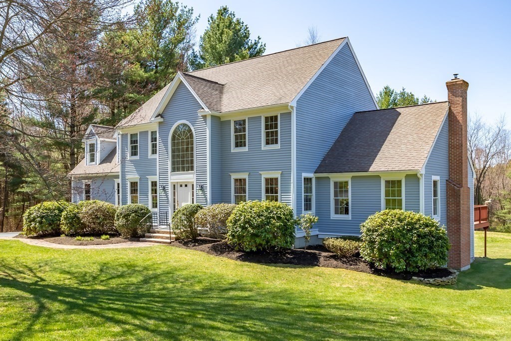 104 Nourse Road Bolton, MA 01740 - Photo 34 of 34 a view of a house with a big yard plants and large trees