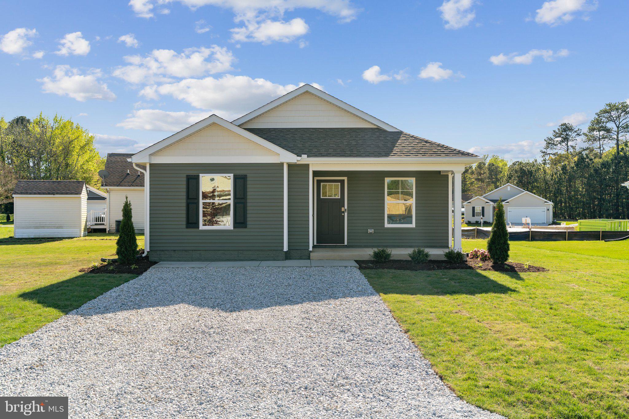 124 Parkland Road Greensboro, MD 21639 - Photo 1 of 20 a view of a house with swimming pool and a yard