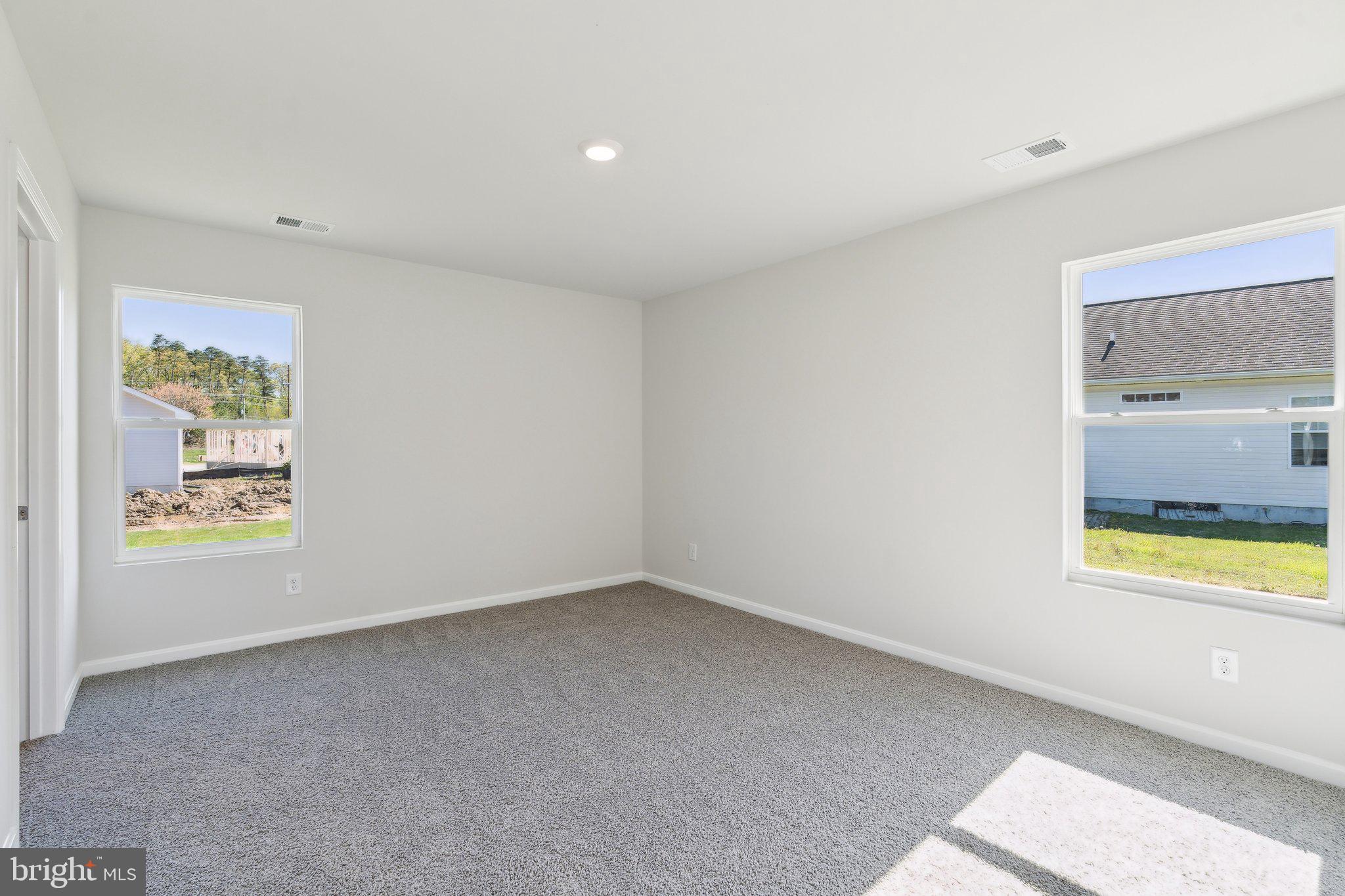 124 Parkland Road Greensboro, MD 21639 - Photo 11 of 20 an empty room with a window