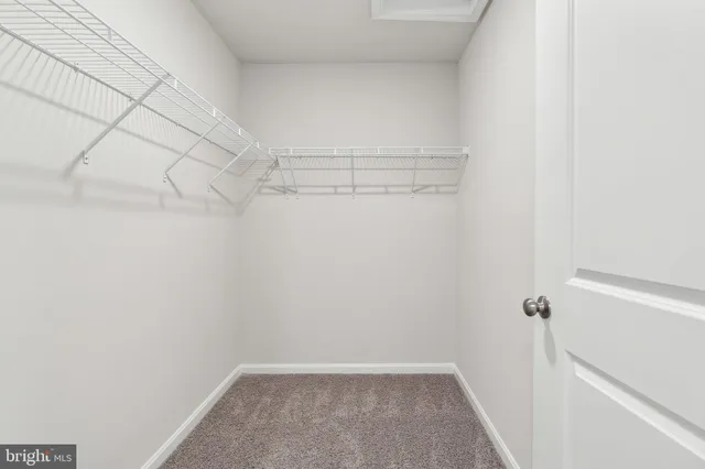 a view of a room with racks on the wall