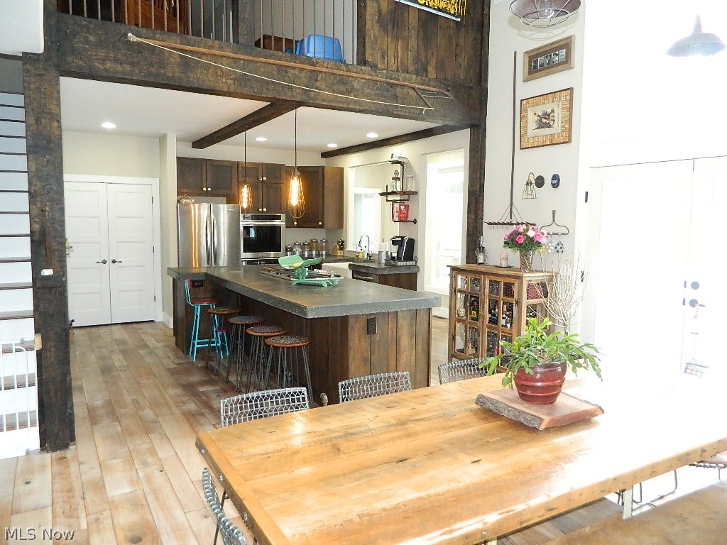 12464 Hotchkiss Road Burton, OH 44021 - Photo 7 of 35 Just Look at the Rustic Detail Combined with a French Country Flair. Can Lighting and Custom Pendant Lighting Adorn the Kitchen As Well!