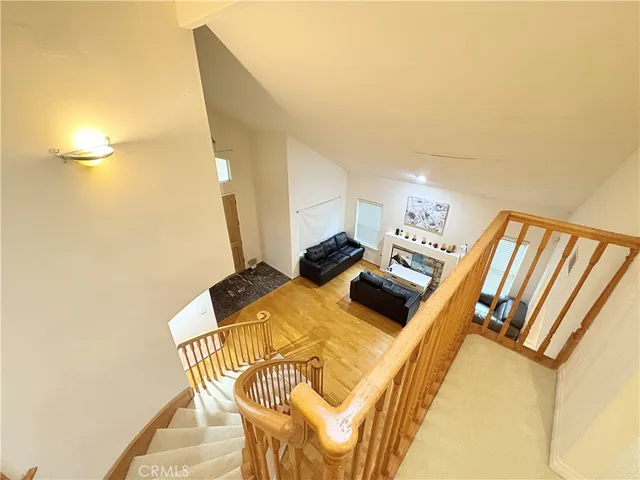 a view of a bedroom with furniture