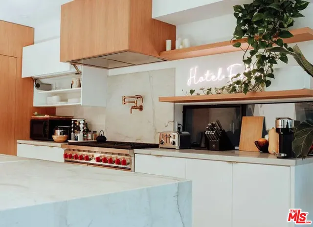 a view of a kitchen with a sink