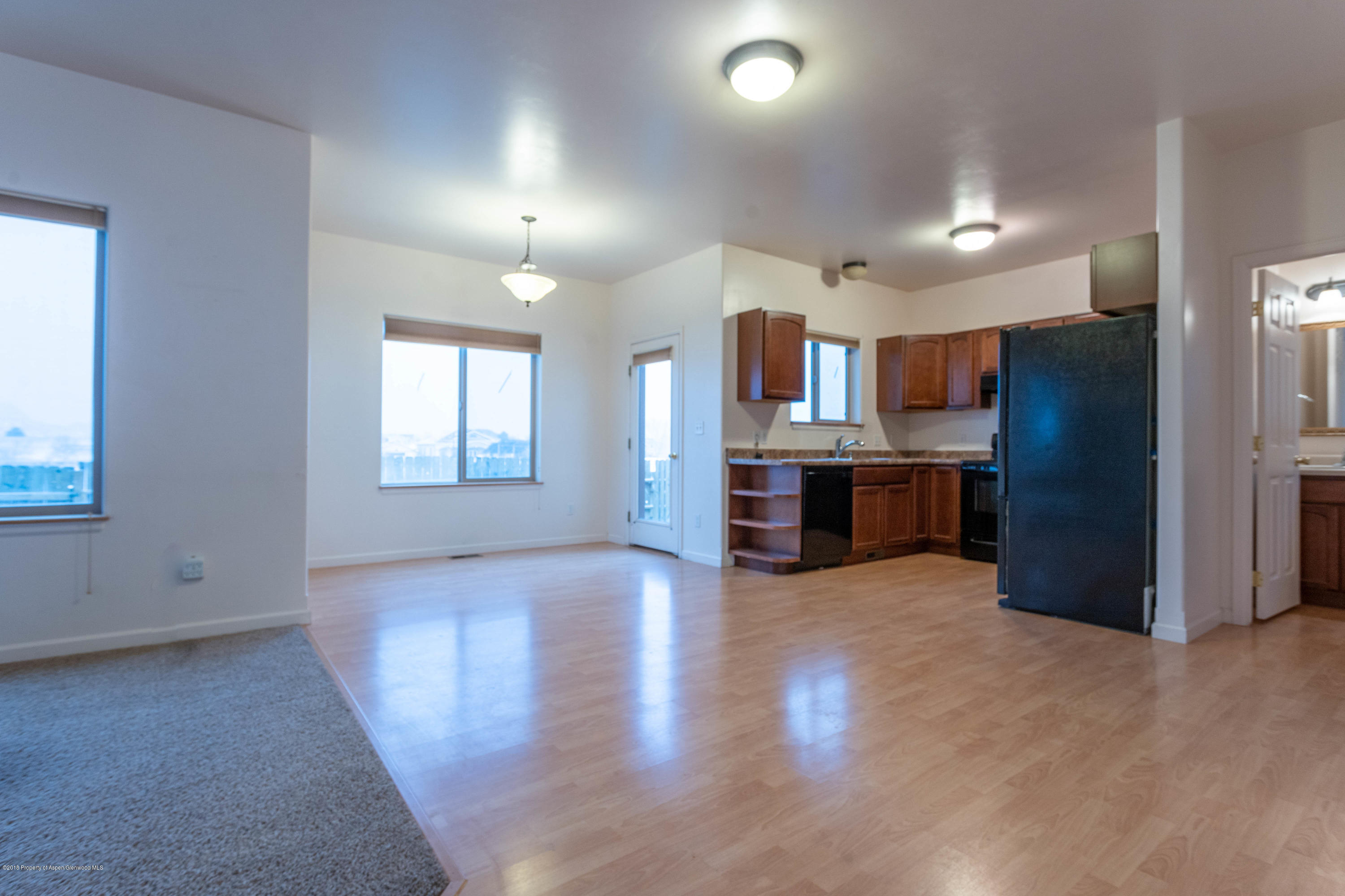 953 East 17th Street Rifle, CO 81650 - Photo 2 of 15 a view of kitchen with wooden floor