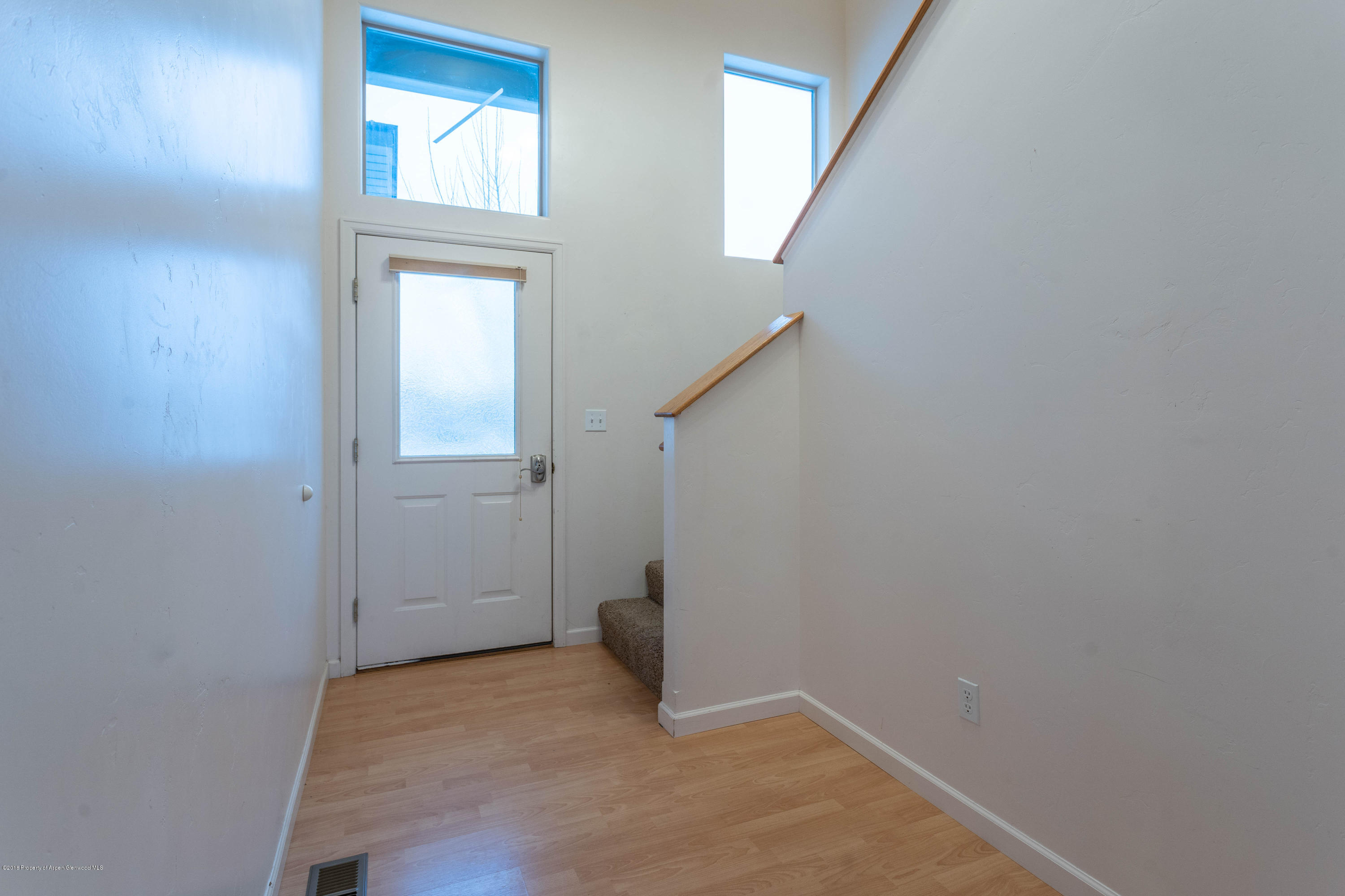 953 East 17th Street Rifle, CO 81650 - Photo 7 of 15 an empty room with windows