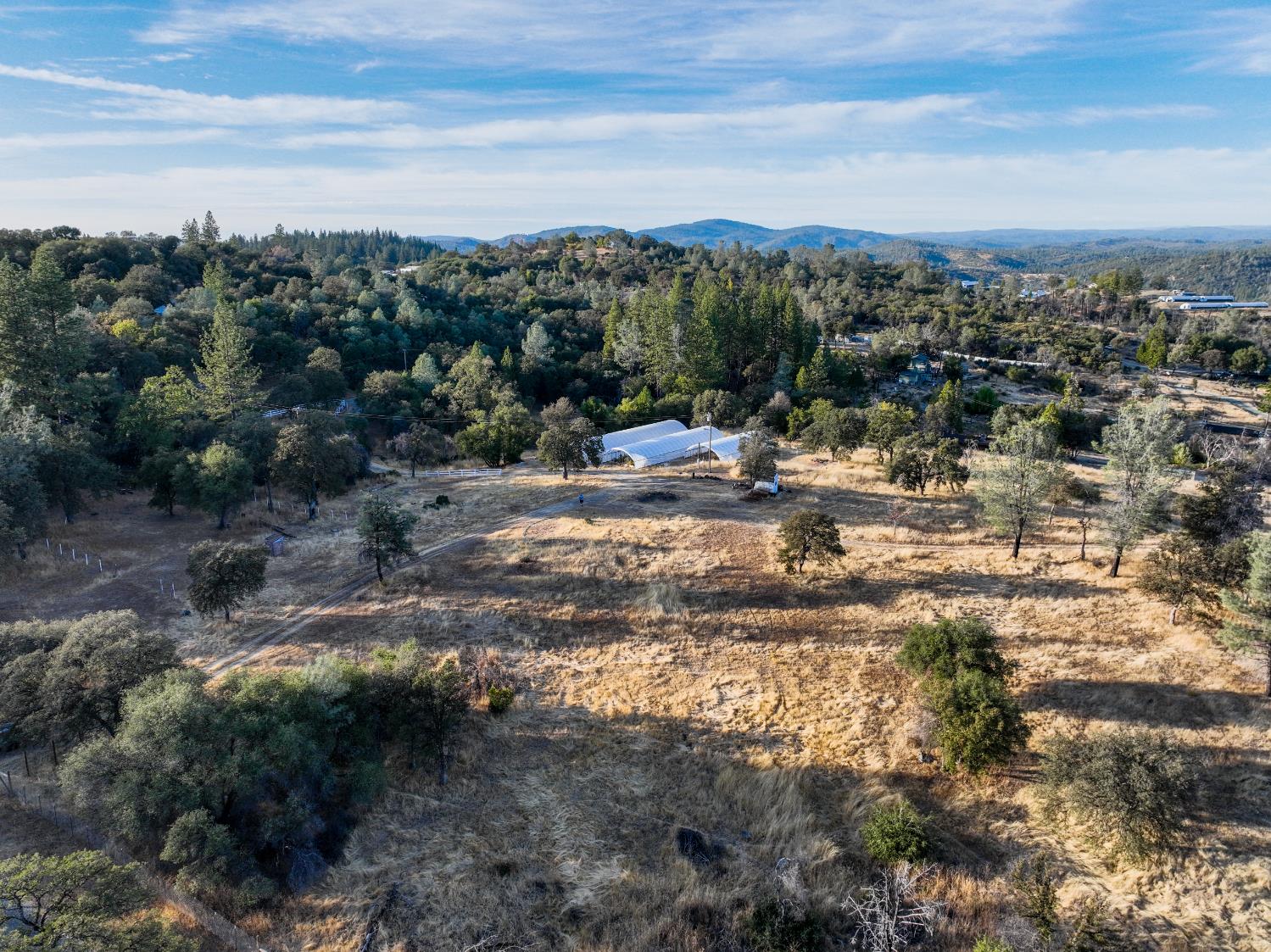 10523 Tasha Road Nevada City, CA 95959 - Photo 16 of 20 a view of a yard with a mountain