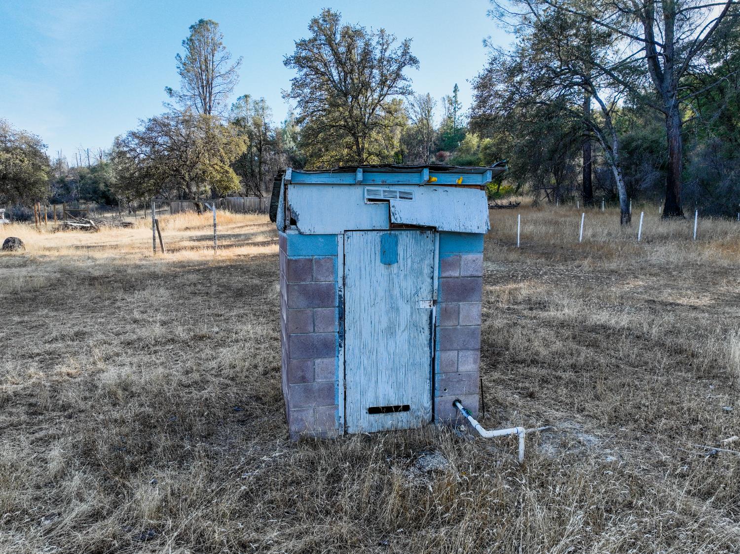 10523 Tasha Road Nevada City, CA 95959 - Photo 3 of 20 a view of a wooden door and a yard