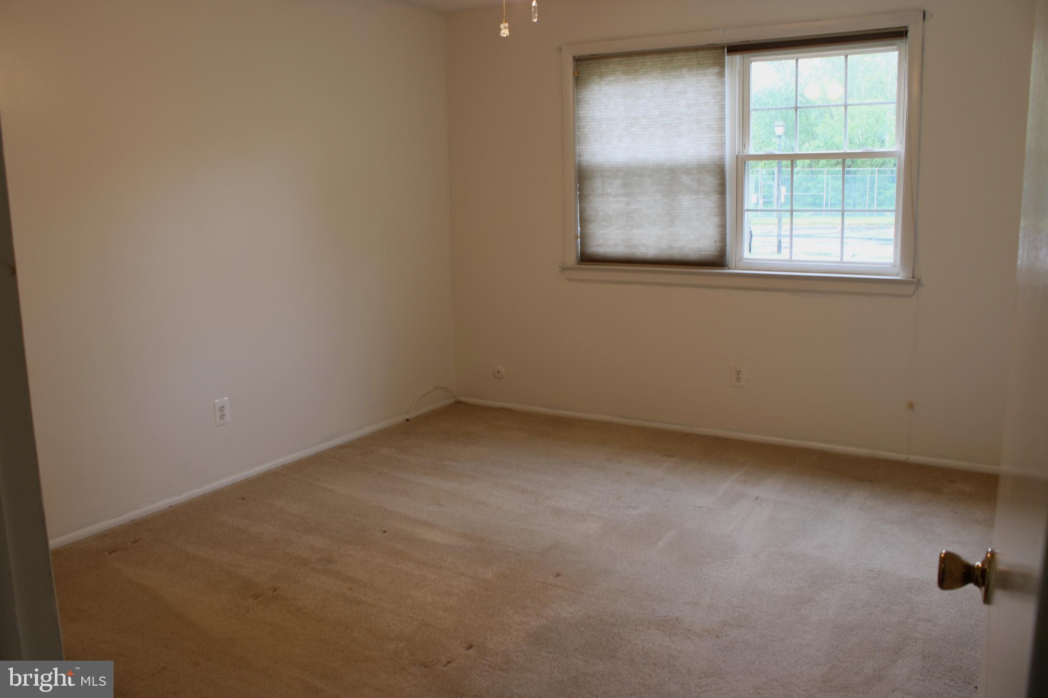 42 Forge Road Medford, NJ 08055 - Photo 6 of 10 an empty room with a window