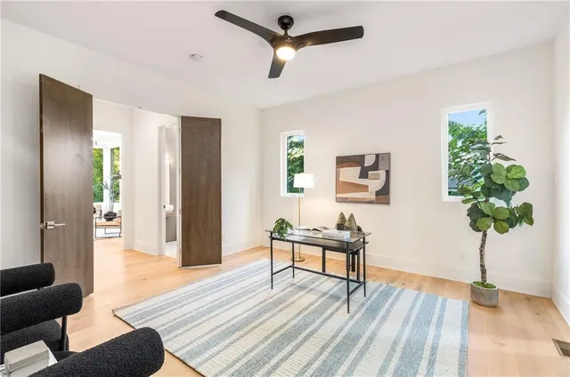 a bathroom with a sink toilet and mirror