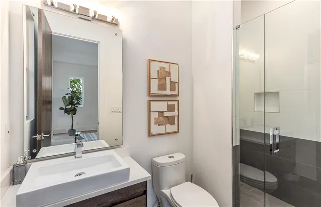 a view of a hallway with chairs